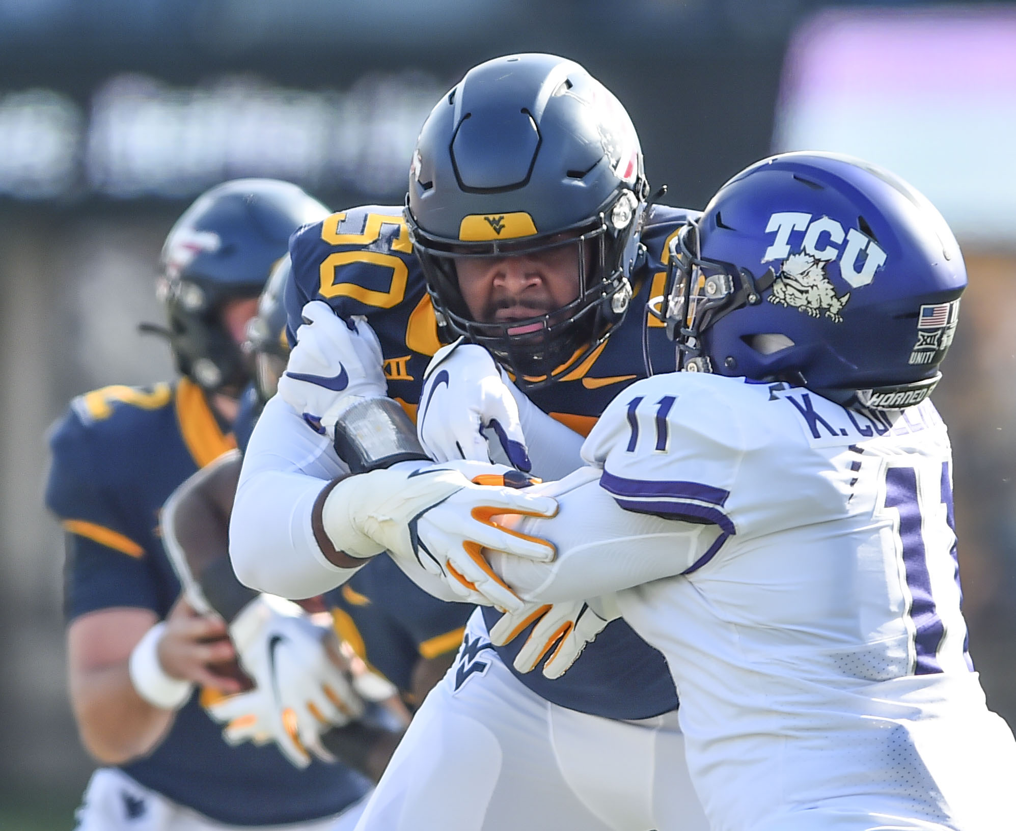 Brandon Yates working on connections with WVU quarterbacks
